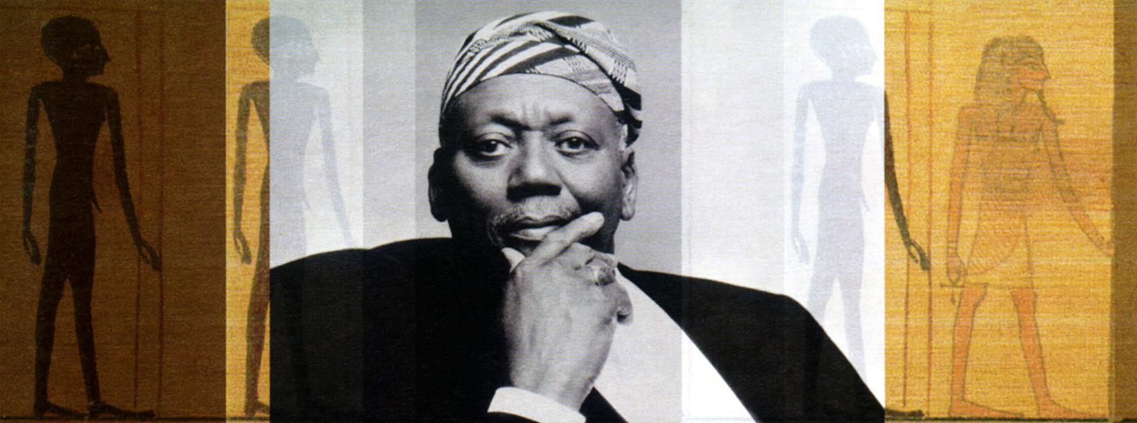 Portrait photo of Randy Weston with his right hand on his chin.