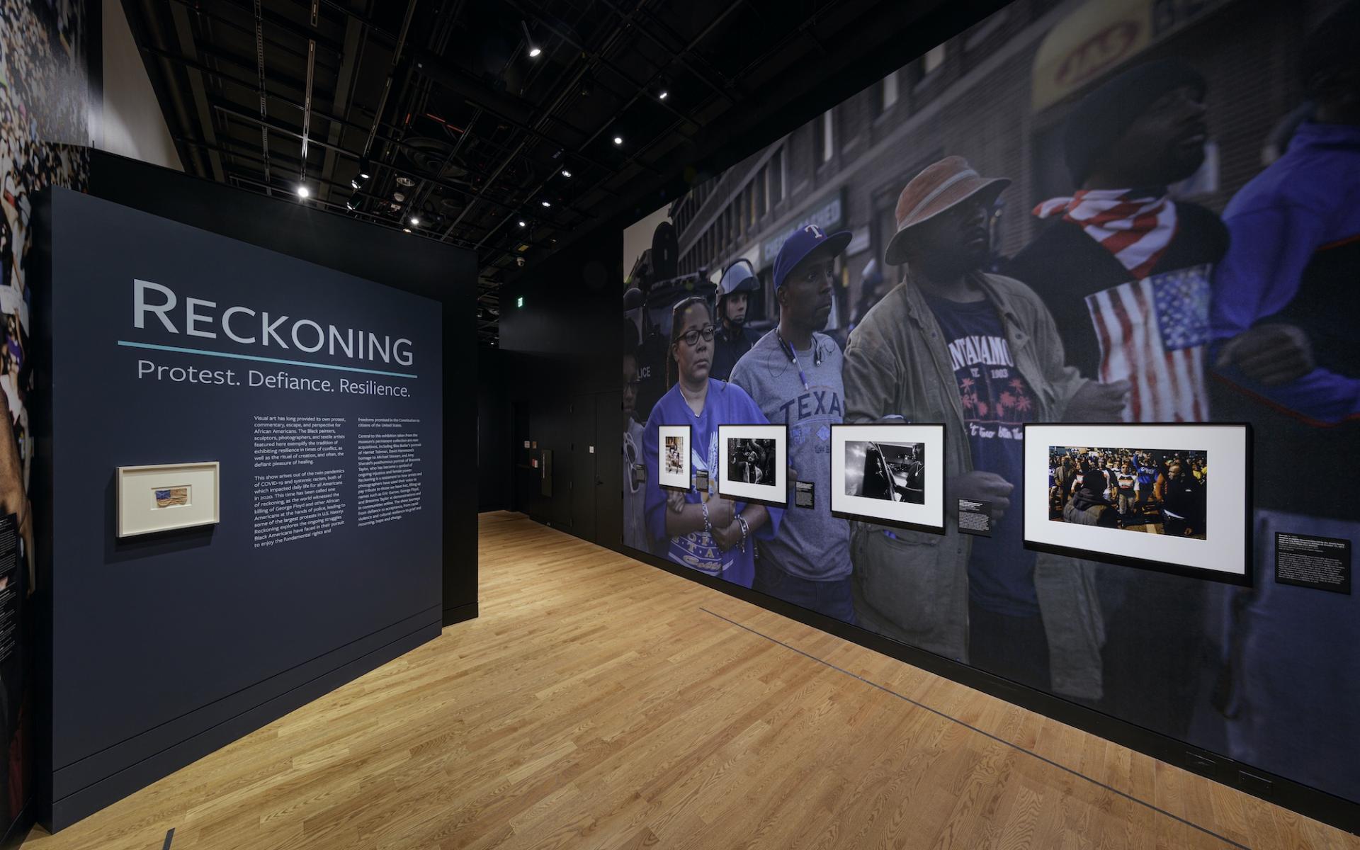 Image of Reckoning gallery entrance with five works of art