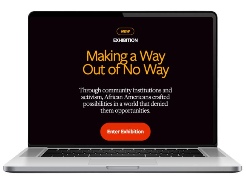 a laptop computer opened with a browser displaying the homepage of the Searchable Museum website.