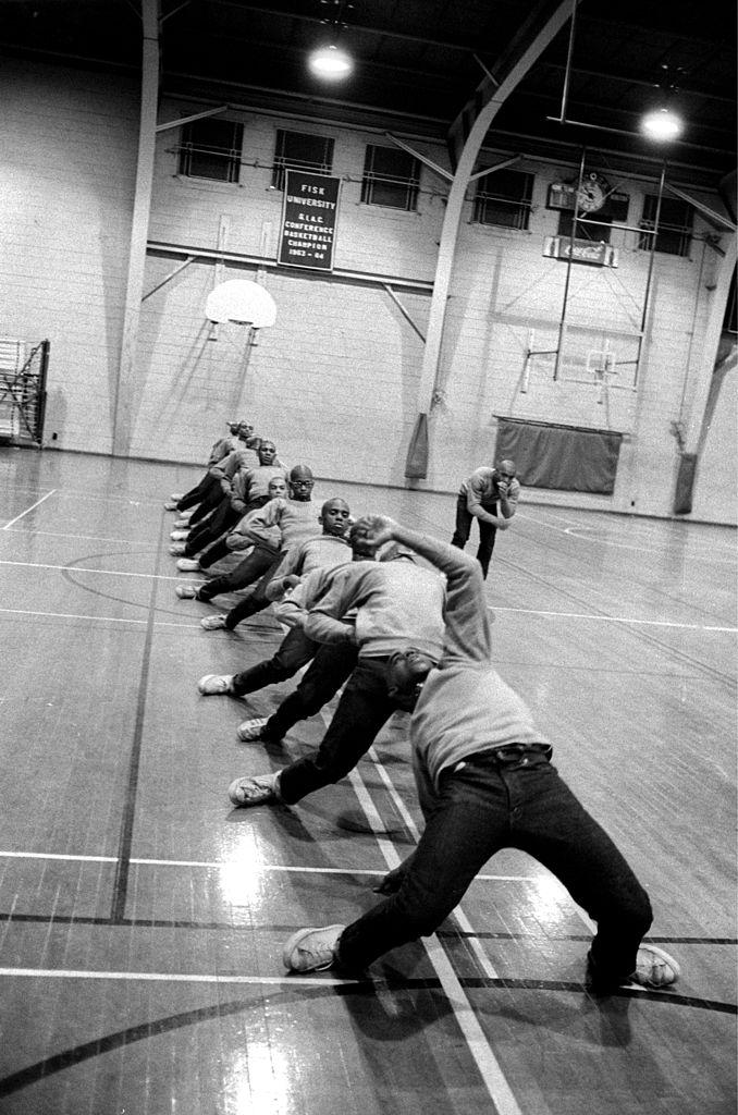 Fraternity pledges for Omega Psi Phi practice their stepping routine in the Fisk University gymnasium, Nashville, Tennessee, 1969.