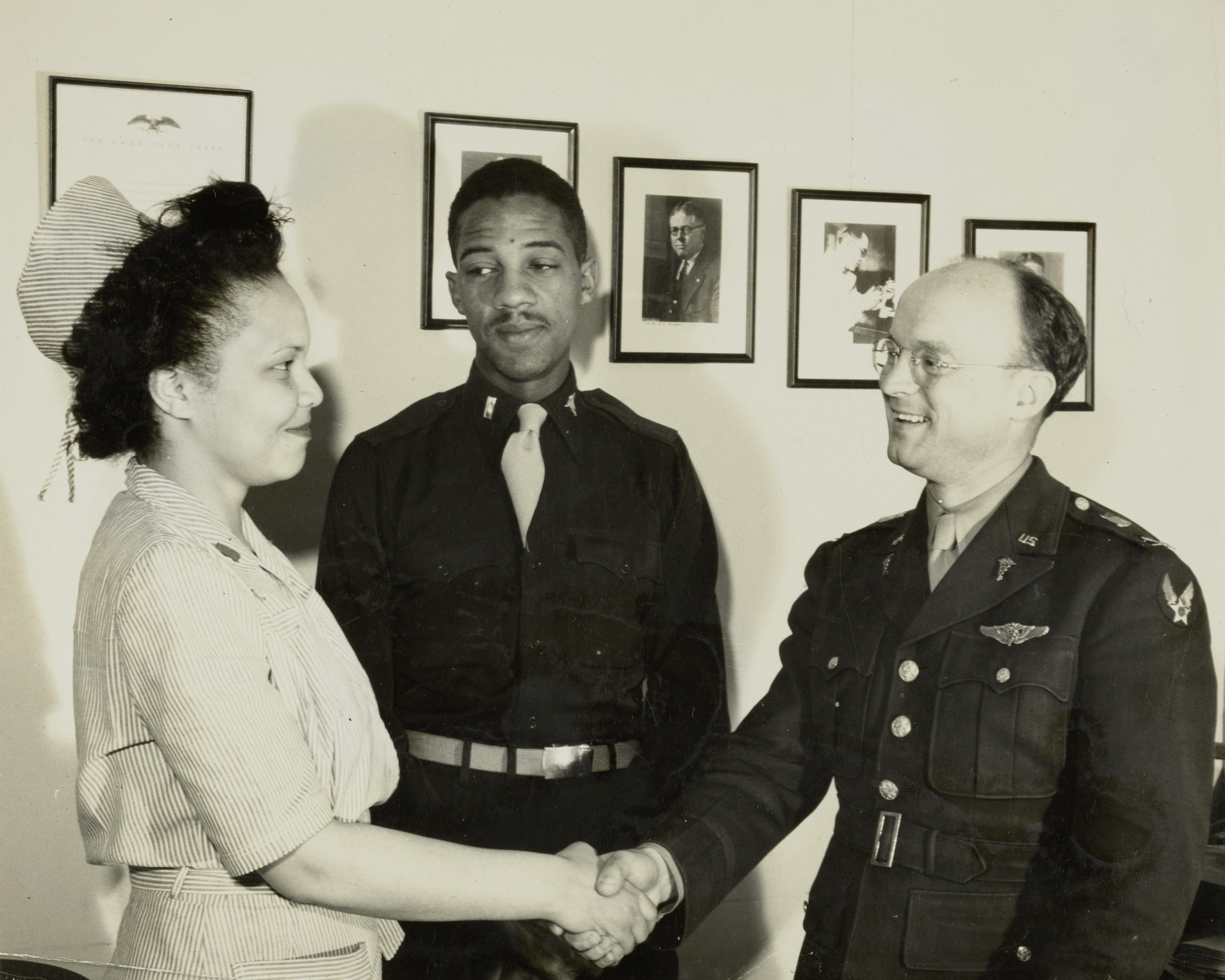 Photograph of Lt. Louise Lomax with Col. Richard Cumming and Lt. Charles Robinson.