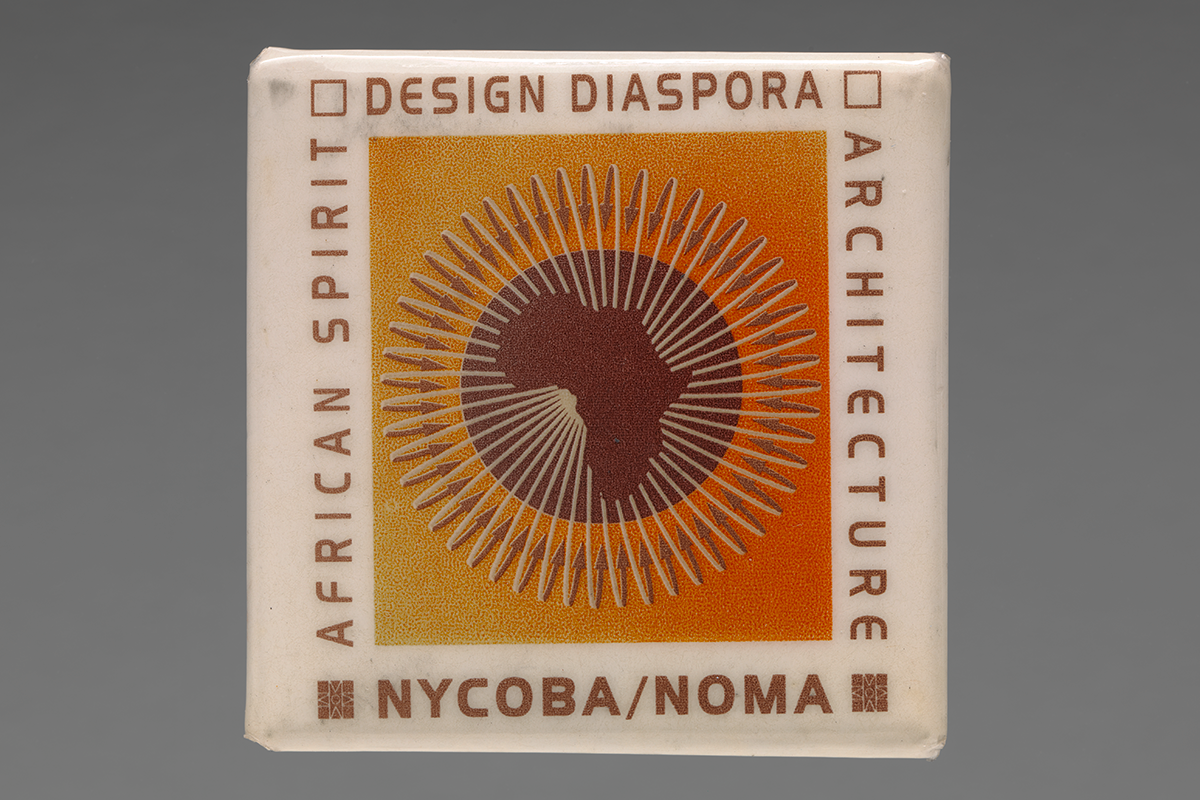 A square button with the words "African Spirit, Design Diaspora, Architecture, NYCOBA/NOMA" around the edge with an image of the continent of Africa in the middle.