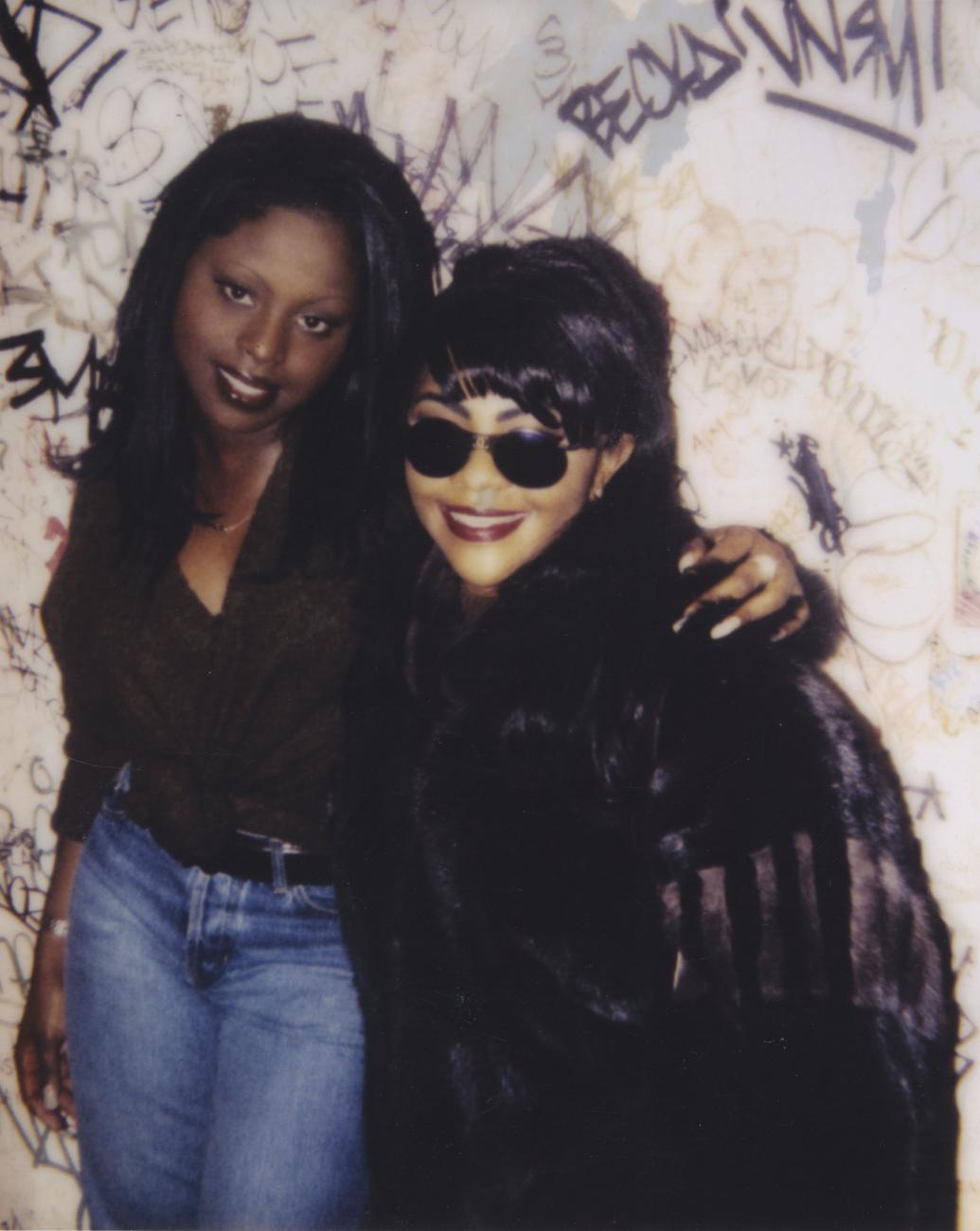 A color photograph of Foxy Brown and Lil Kim, NYC, 1996.