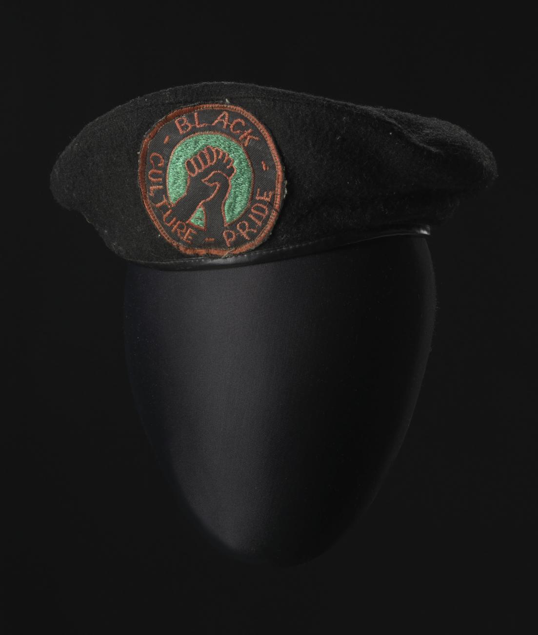 A black beret with a patch