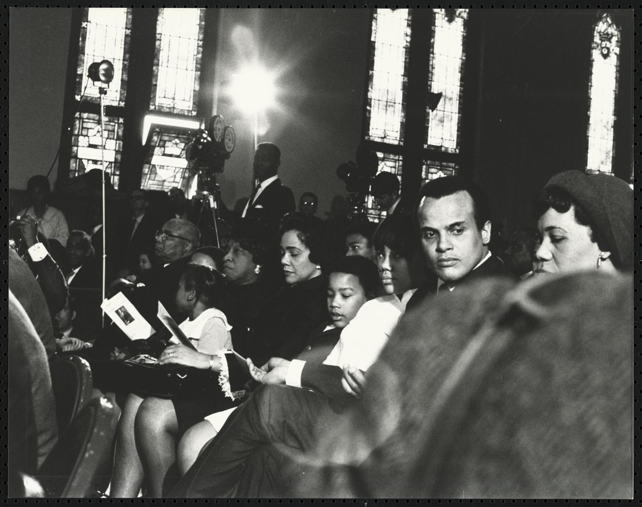 Harry Belafonte Jr. seated with Mrs. Coretta Scott King and her children January 15, 1969; printed 2011 ink on paper