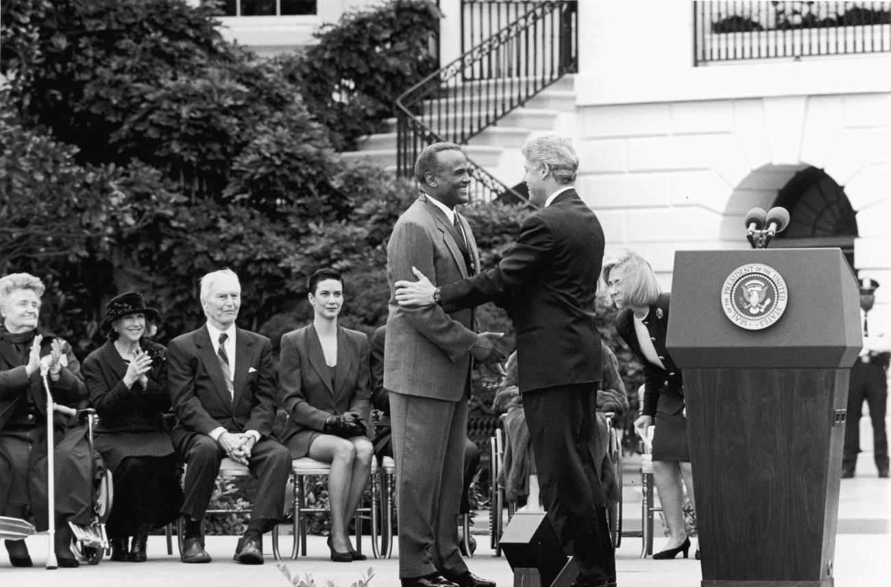 Harry Belafonte receives the National Medal of Arts award from President Bill Clinton in 1994.