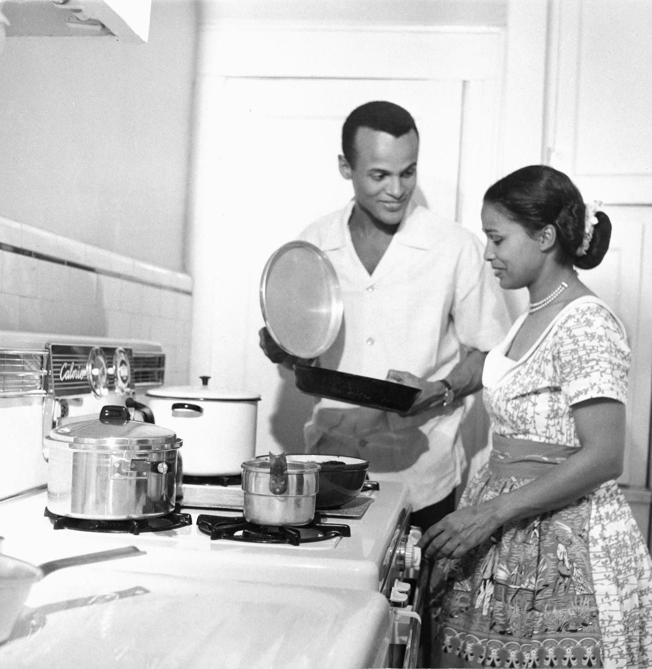 Harry Belafonte is photographed making dinner with wife Marguerite Belafonte.