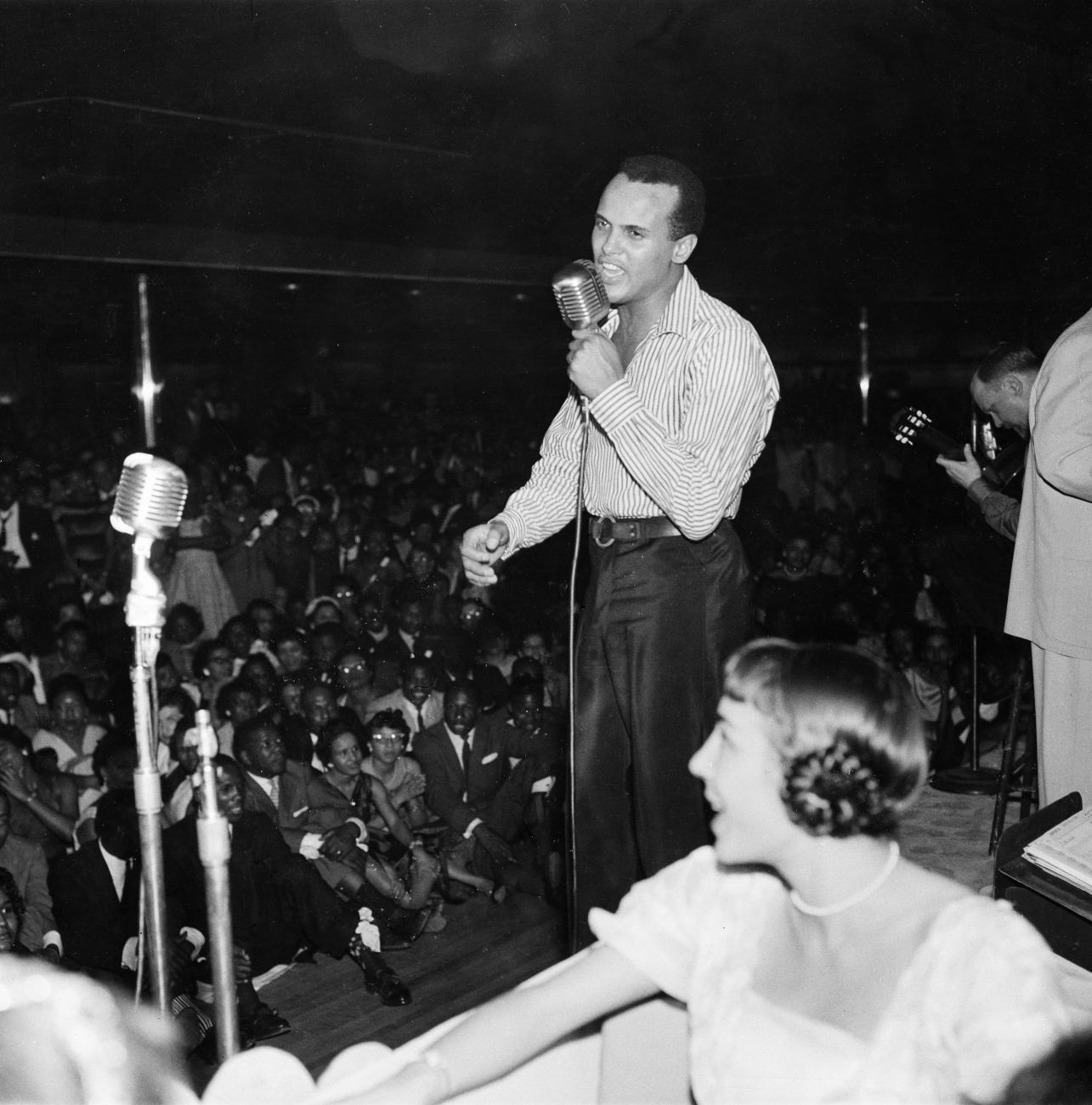 Harry Belafonte performing on stage.