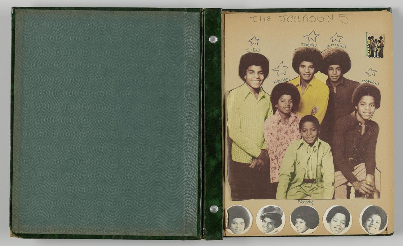 A scrap book page with images of the Jackson 5. 