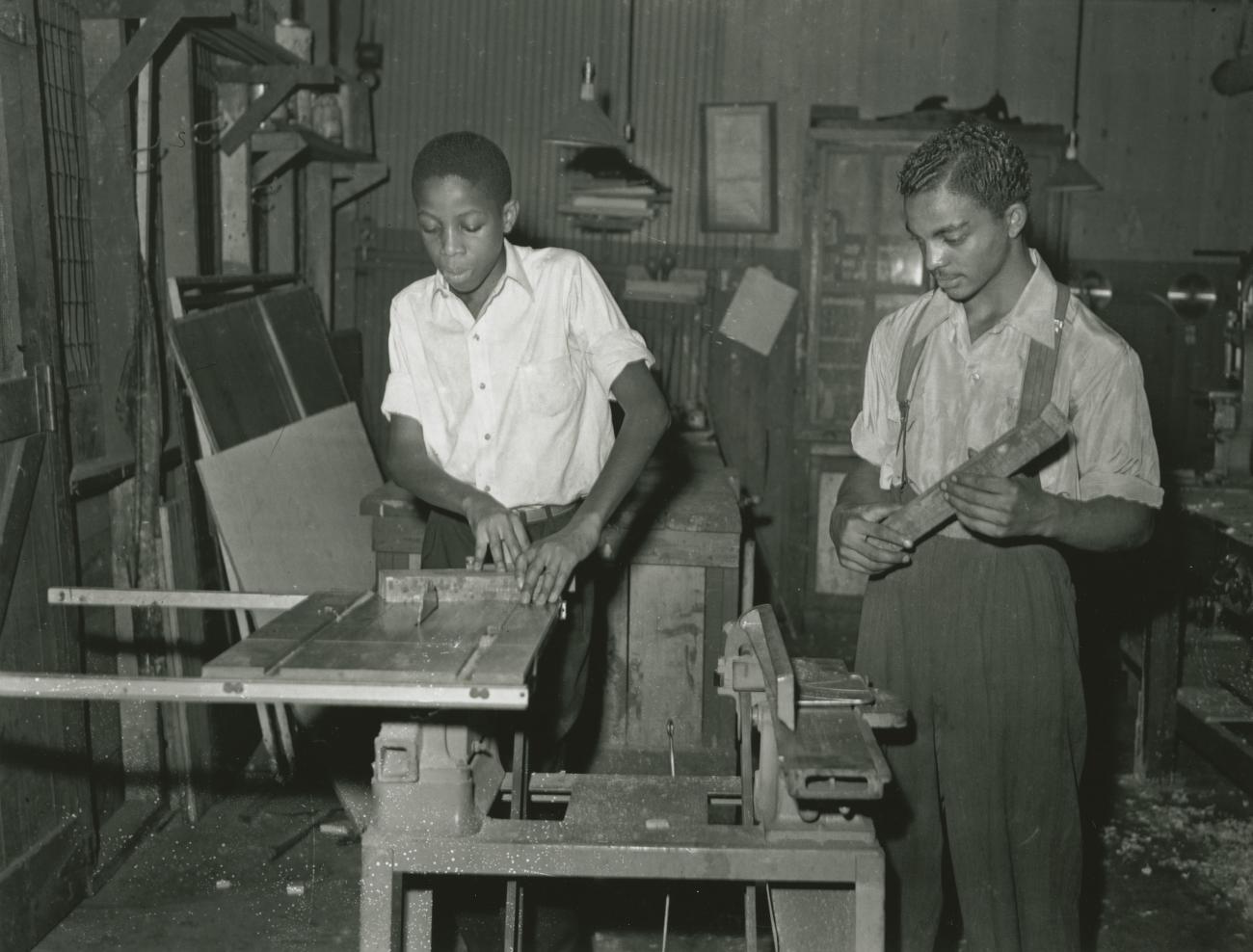 Two young men in wood shop