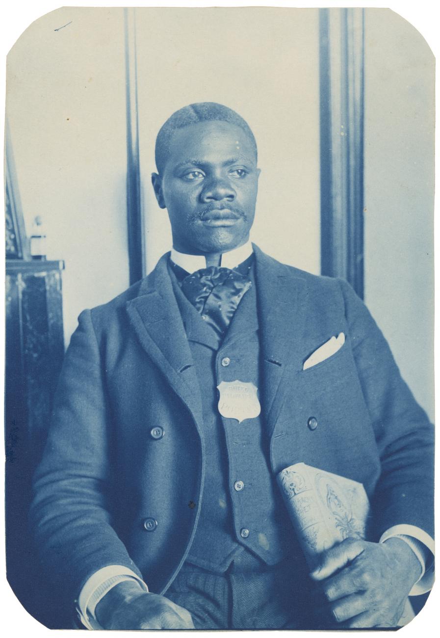 A cyanotype of a hotel porter. 