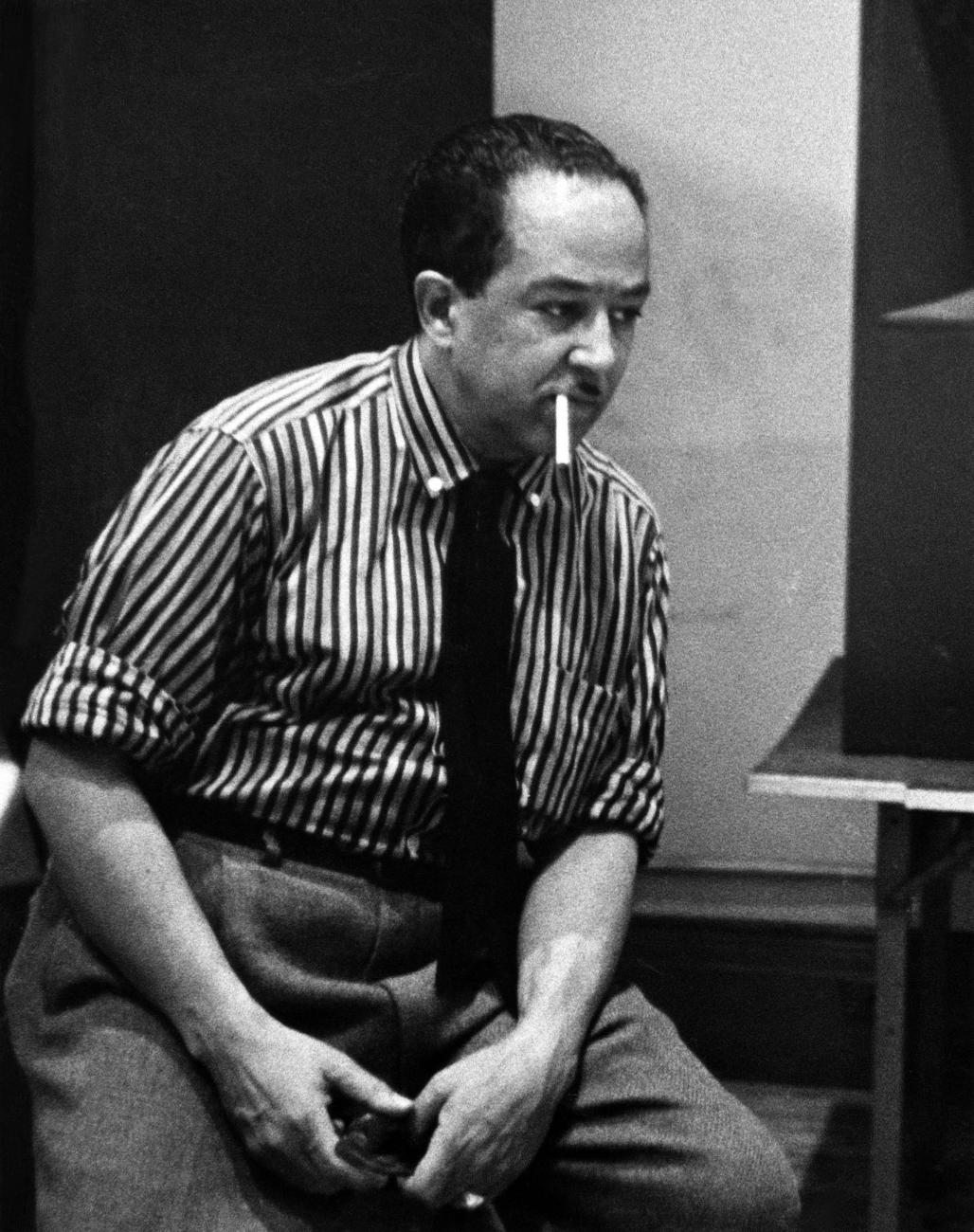 Poet Langston Hughes sitting. Date of the photo is unknown.