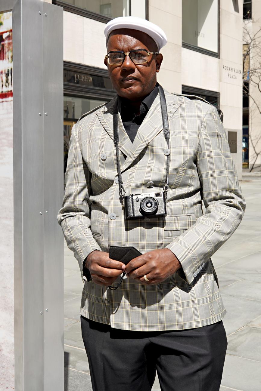 Photographer Jamel Shabazz poses for a photo at a public art initiative in New York City in 2021.