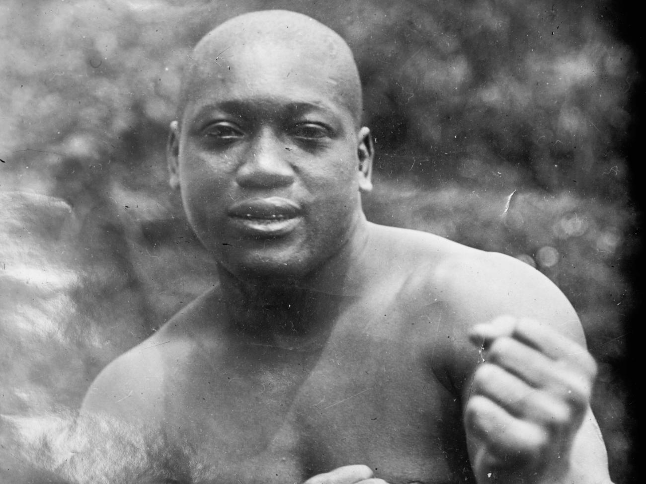 Black and white portrait of heavyweight boxer Jack Johnson