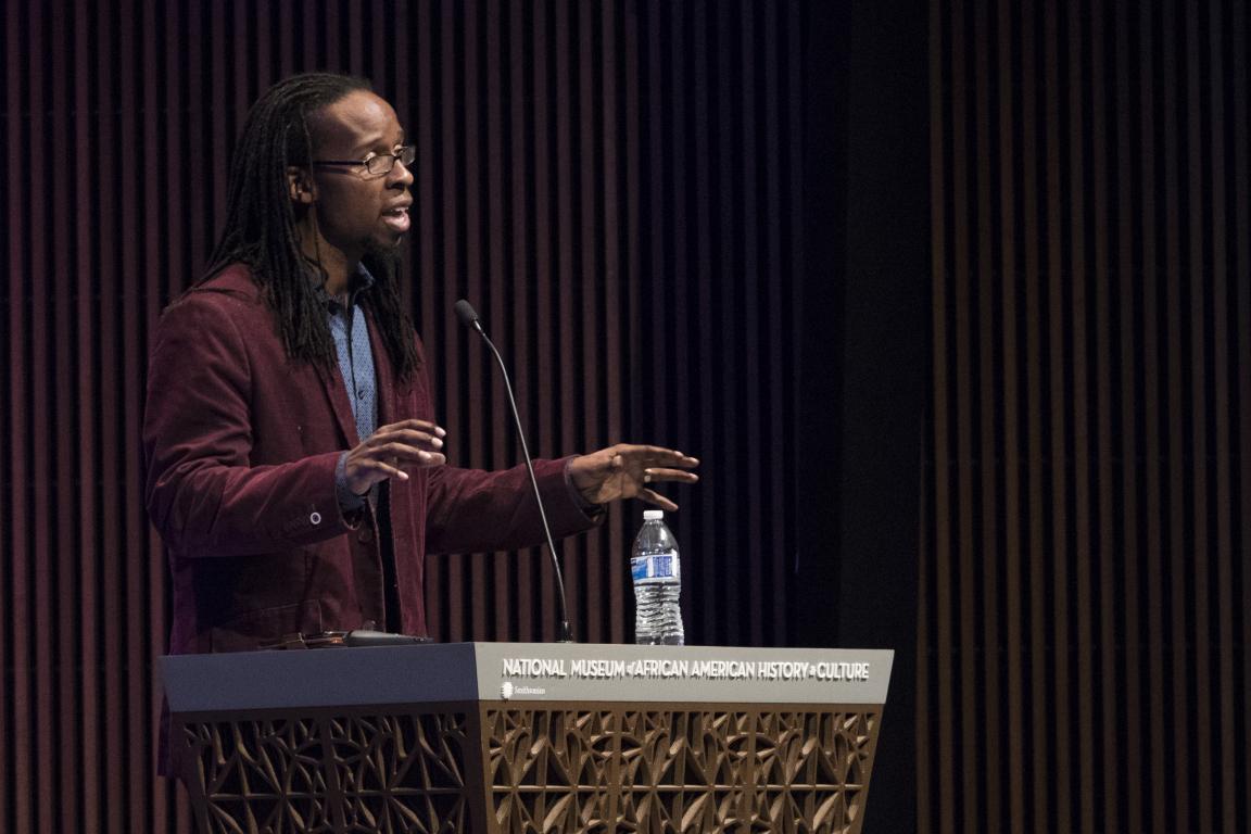 Ibram X. Kendi delivering the symposium keynote address
