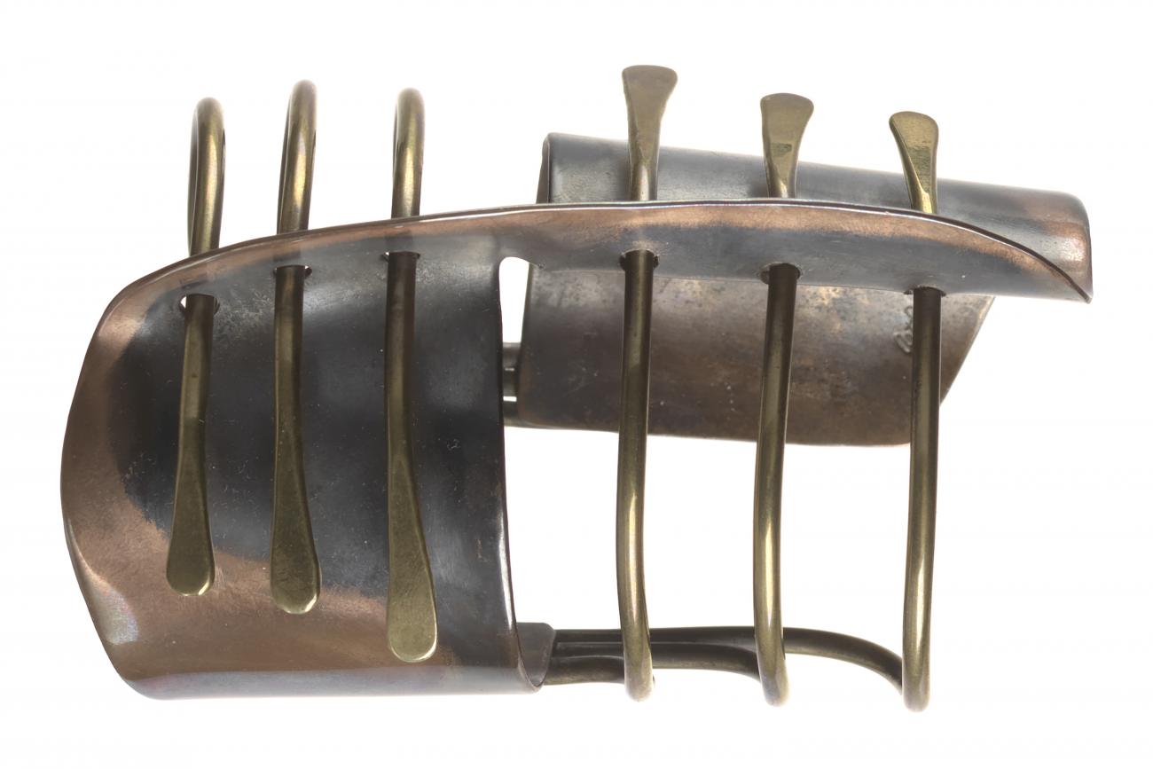 A copper and brass "Modern Cuff" bracelet by Art Smith.