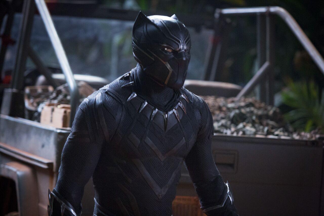 Actor Chadwick Boseman as Black Panther in a scene from the film Black Panther in the signature black and silver adorned costume that will be displayed in the National Museum of African American History and Culture.