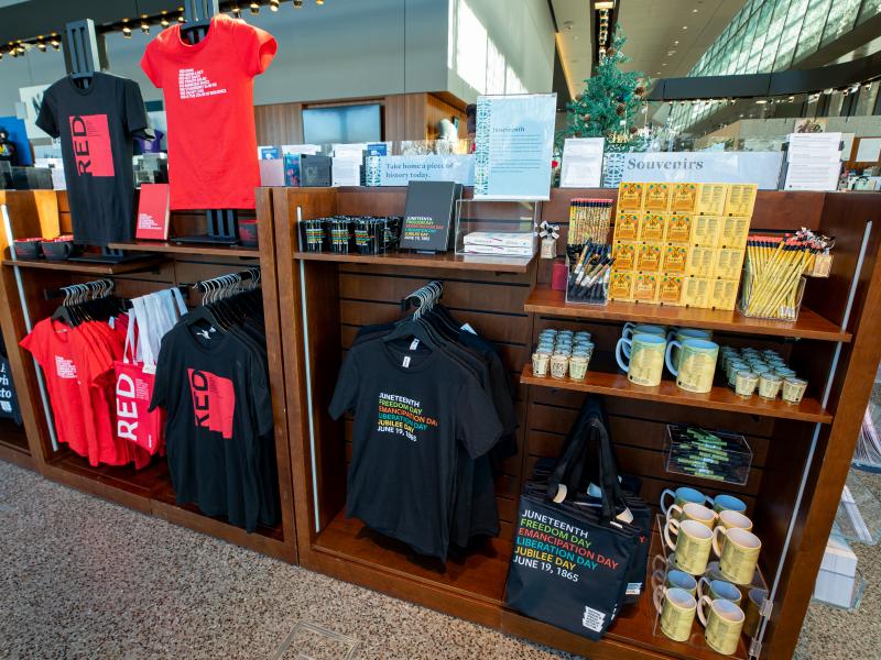 image of a fixture in the museum store containing NMAAHC Juneteenth Merchandise