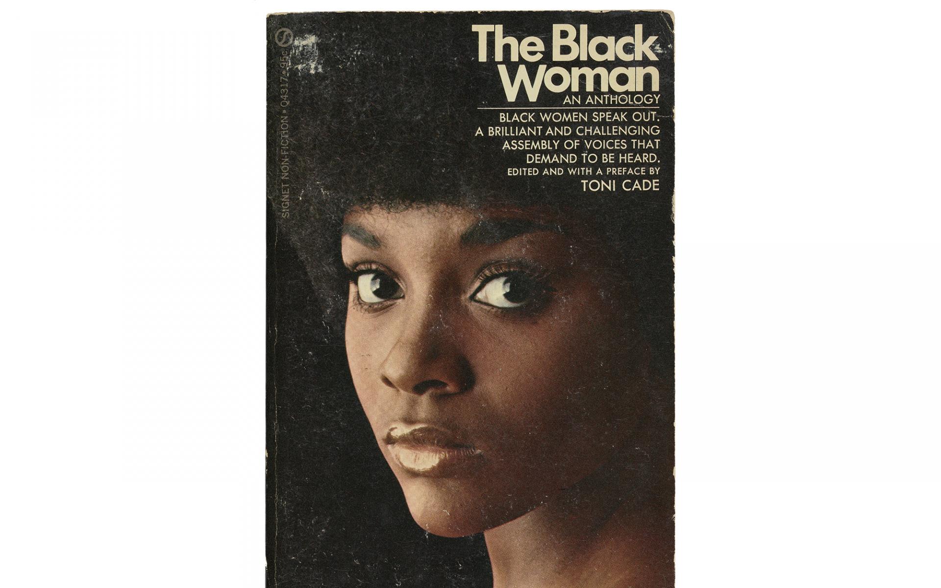 The top of a woman's fase with the text "The Black Woman" in the top right corner