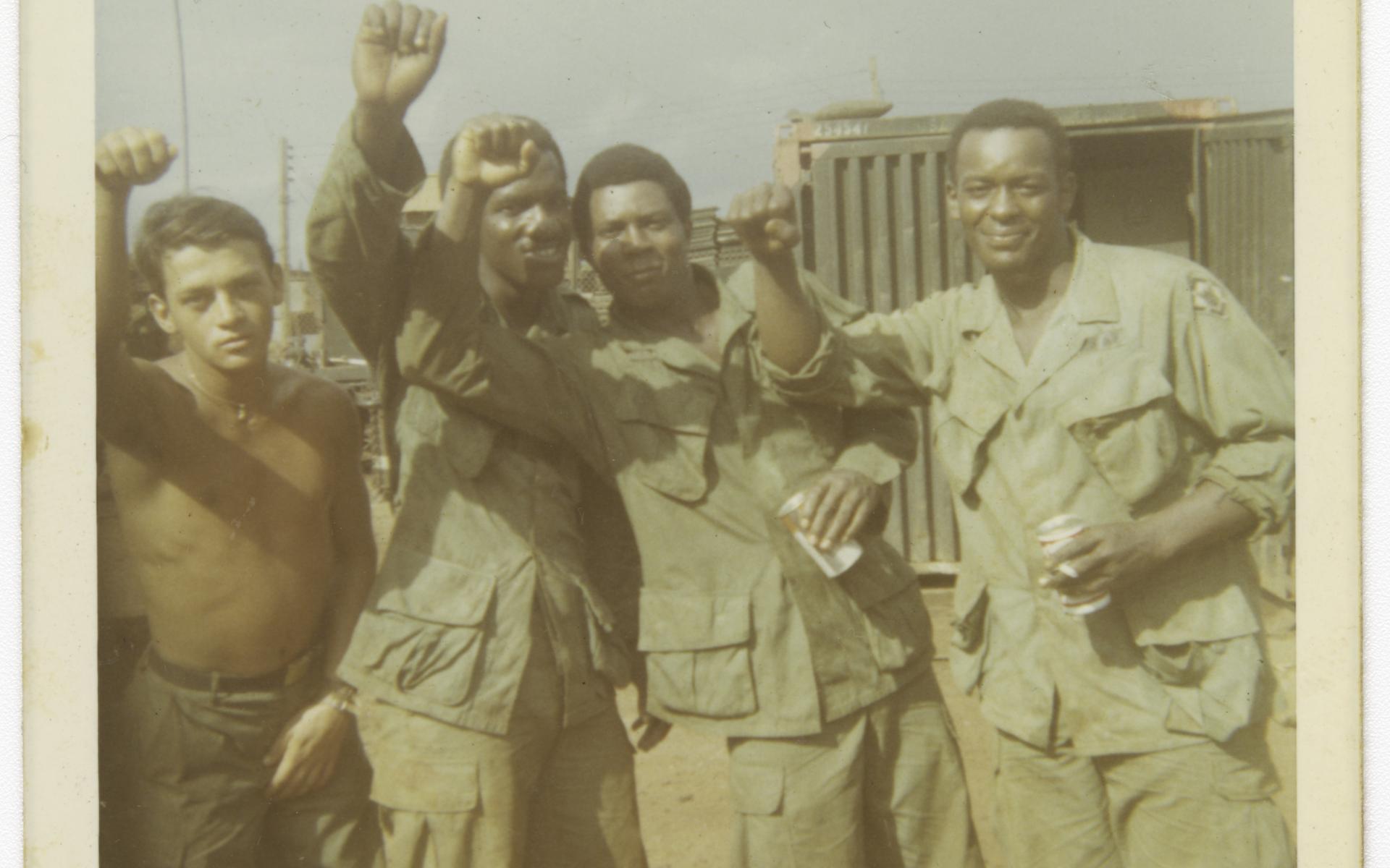 Photograph of four American soldiers in Vietnam