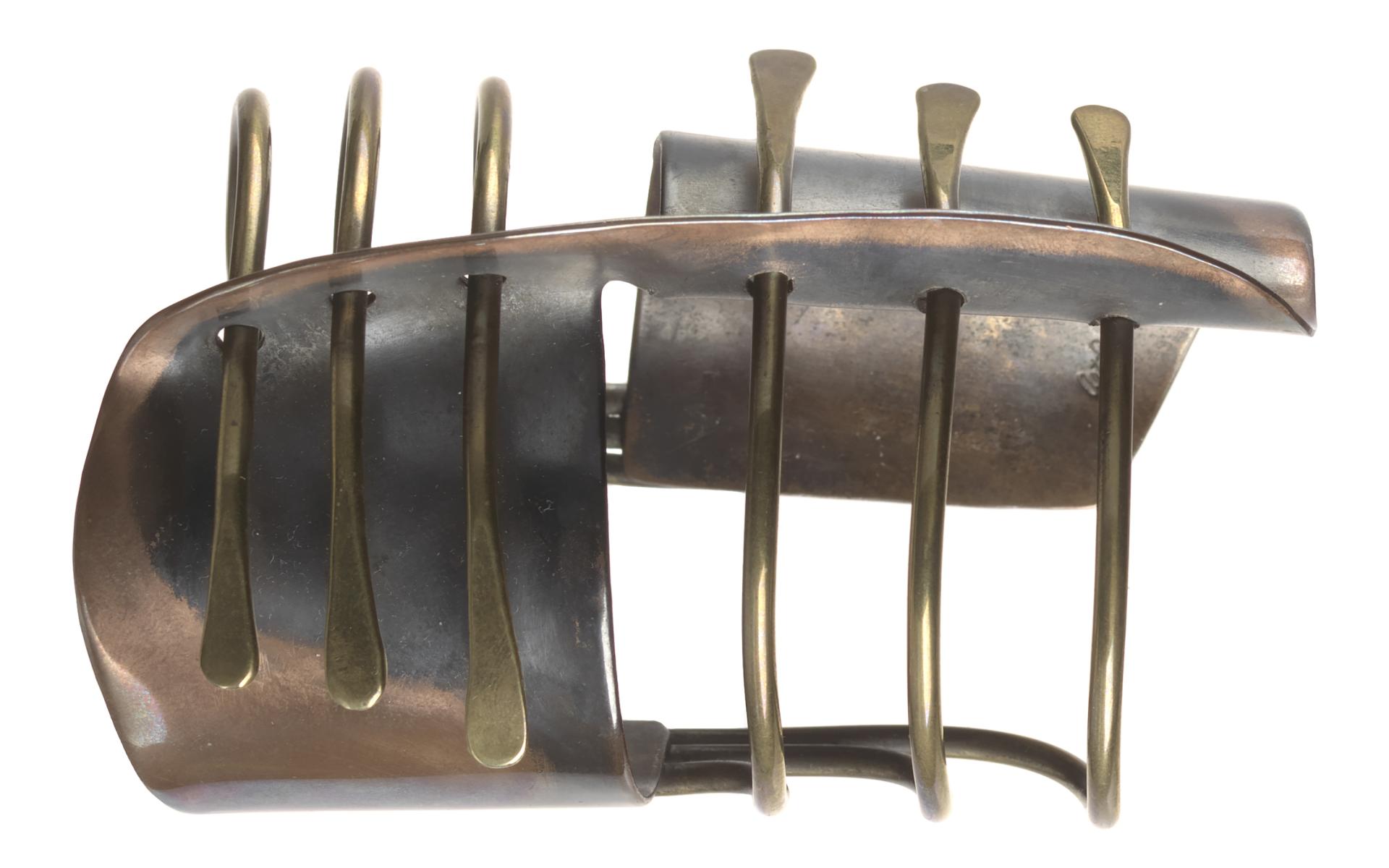 A copper and brass "Modern Cuff" bracelet by Art Smith.