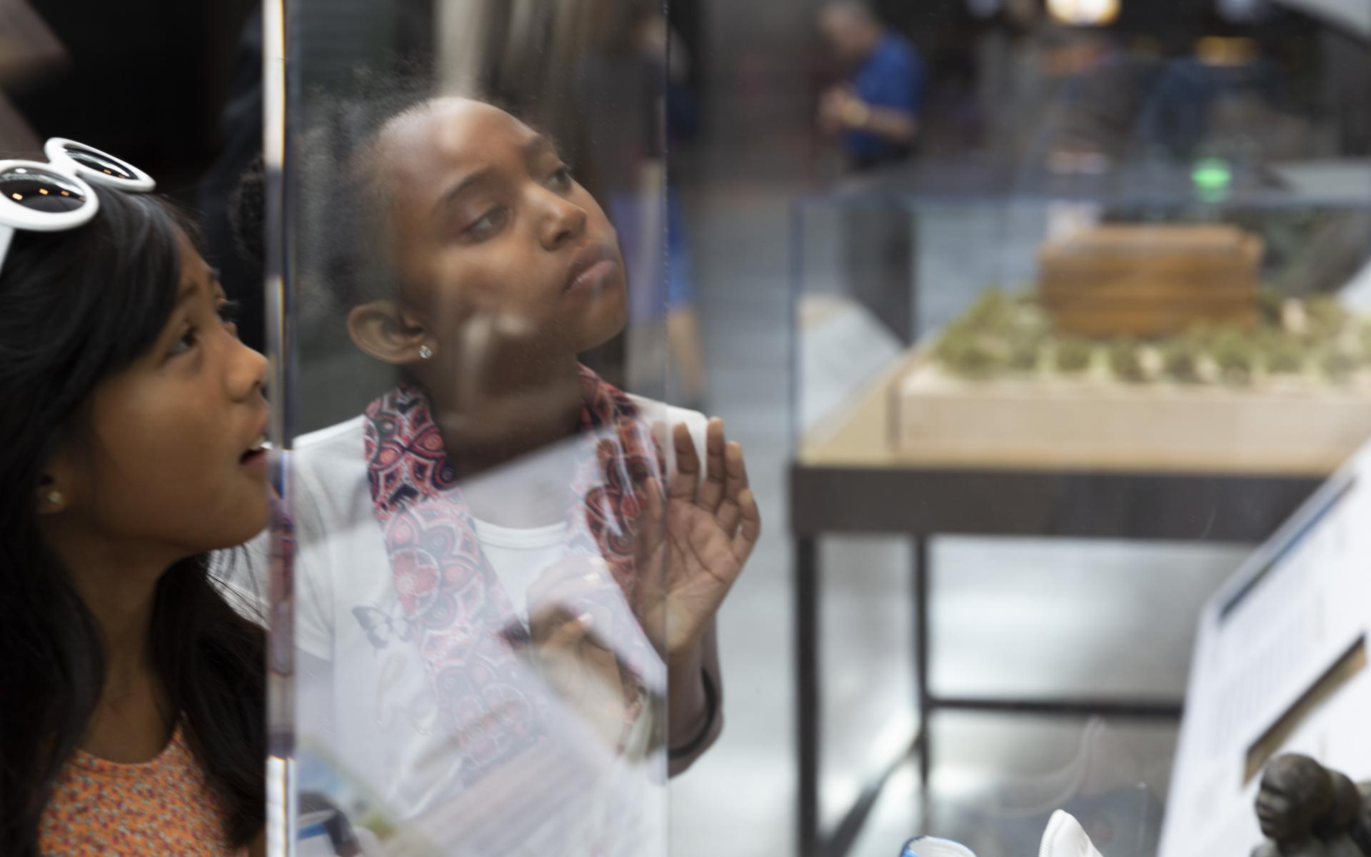 Young children exploring the museum